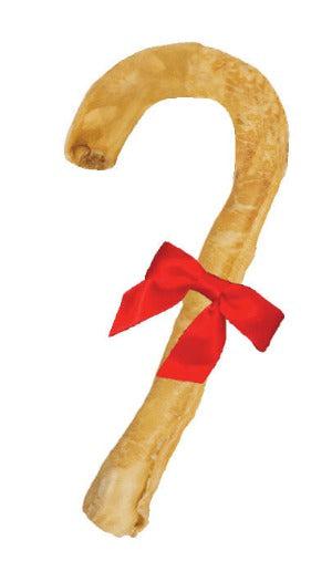 Collagen dog treat in a cane shape with a red bow.