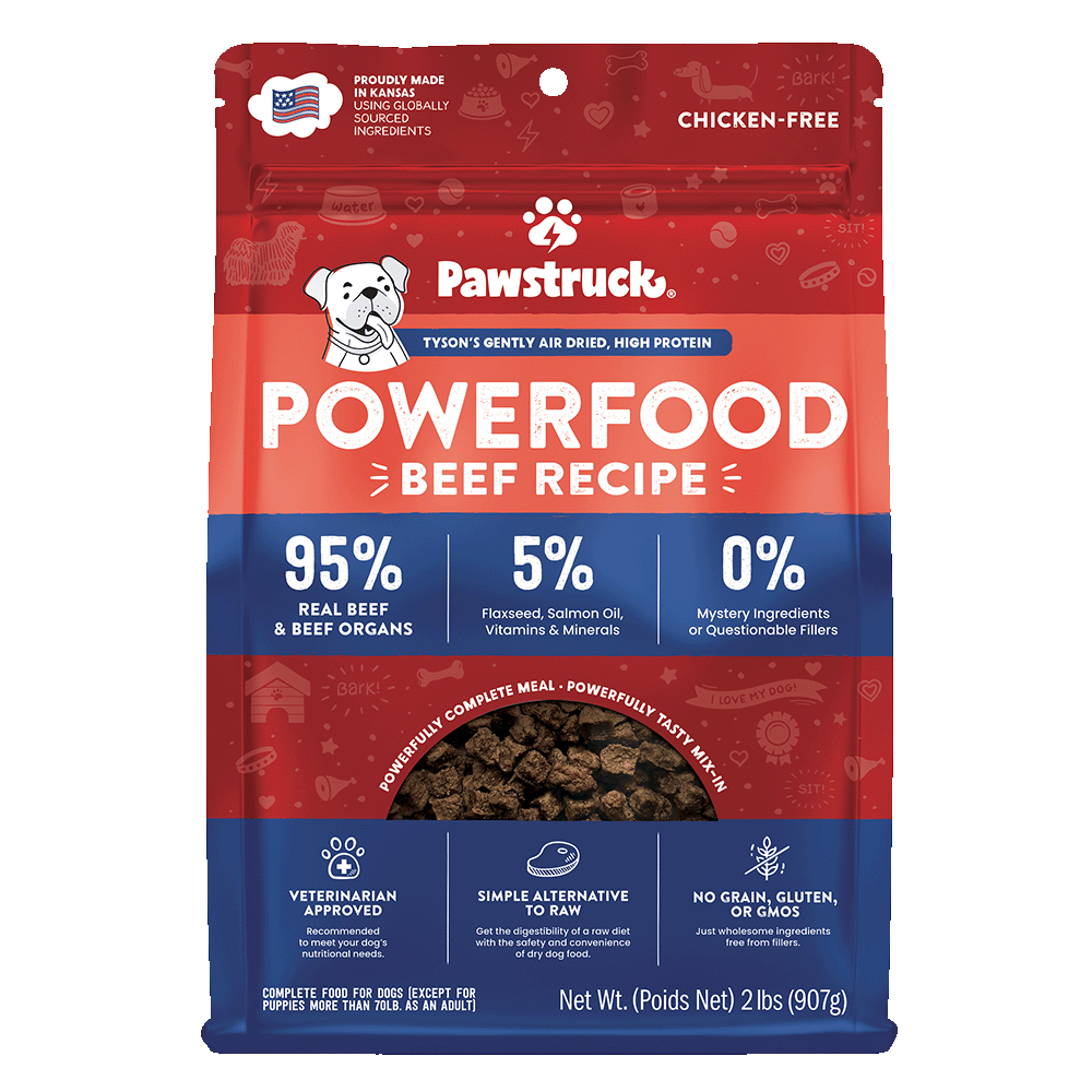 A package of Pawstruck brand air dried dog food in Beef recipe flavor. The packaging is predominantly red with an illustration of a dog and text detailing the product type and nutritional information.