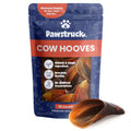 A package of Pawstruck cow hooves for dogs with one hoof visible, showing a dried, natural dog chew treat.