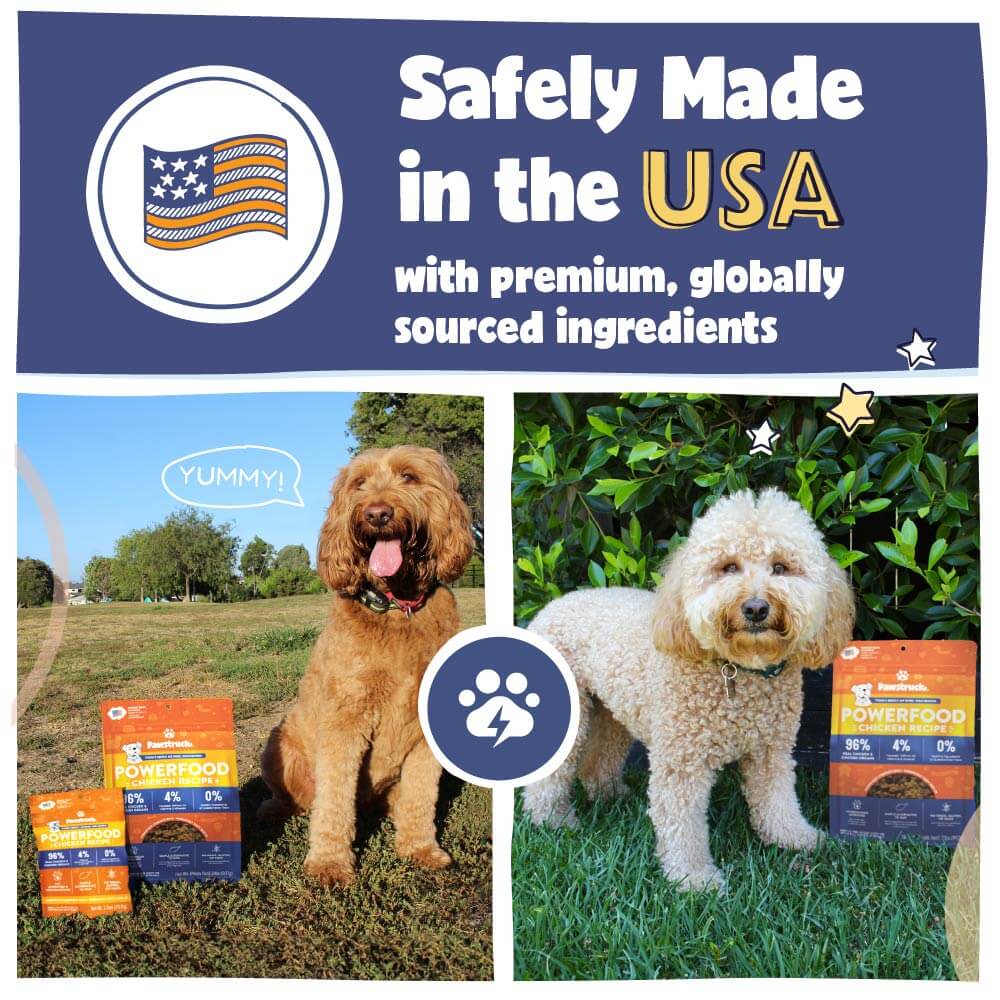 Two dogs with bags of dog food outdoors, featuring text about safely made in the USA with globally sourced ingredients.