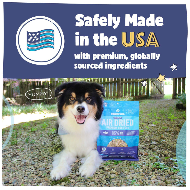 Image of black and white dog next to a blue bag of air dried dog food stating safely made in the USA with globally sourced ingredients