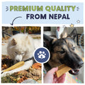 Two dogs interacting with a wooden chew toy, with text 'Premium Quality from Nepal' above.